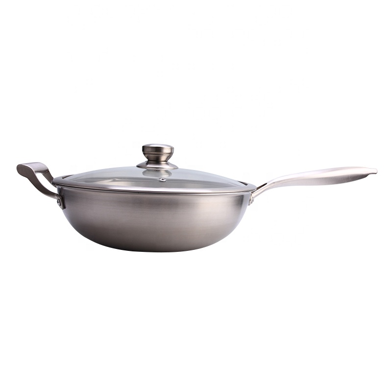 stainless steel wok with visible  lid lock and handle